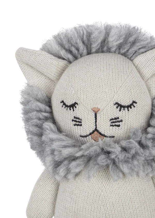 Baby lion toy made of organic cotton Konges Sløjd – gray, knitted, with hand-made mane and closed eyes
